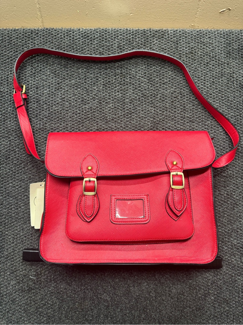 Classic Red Leather Satchel with Front Pocket and Adjustable Strap